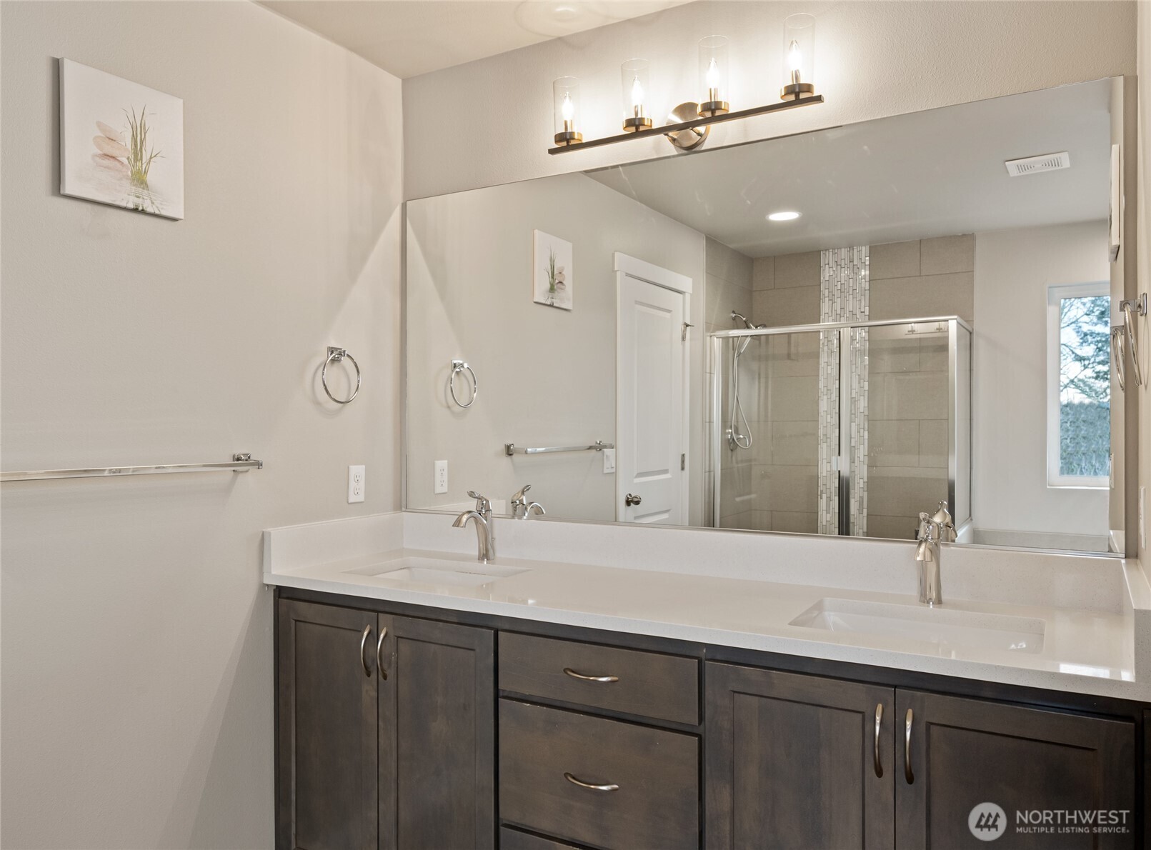 711 10th Street Sultan, WA 98294 - Photo 20 of 30 a bathroom with a double vanity sink and a mirror