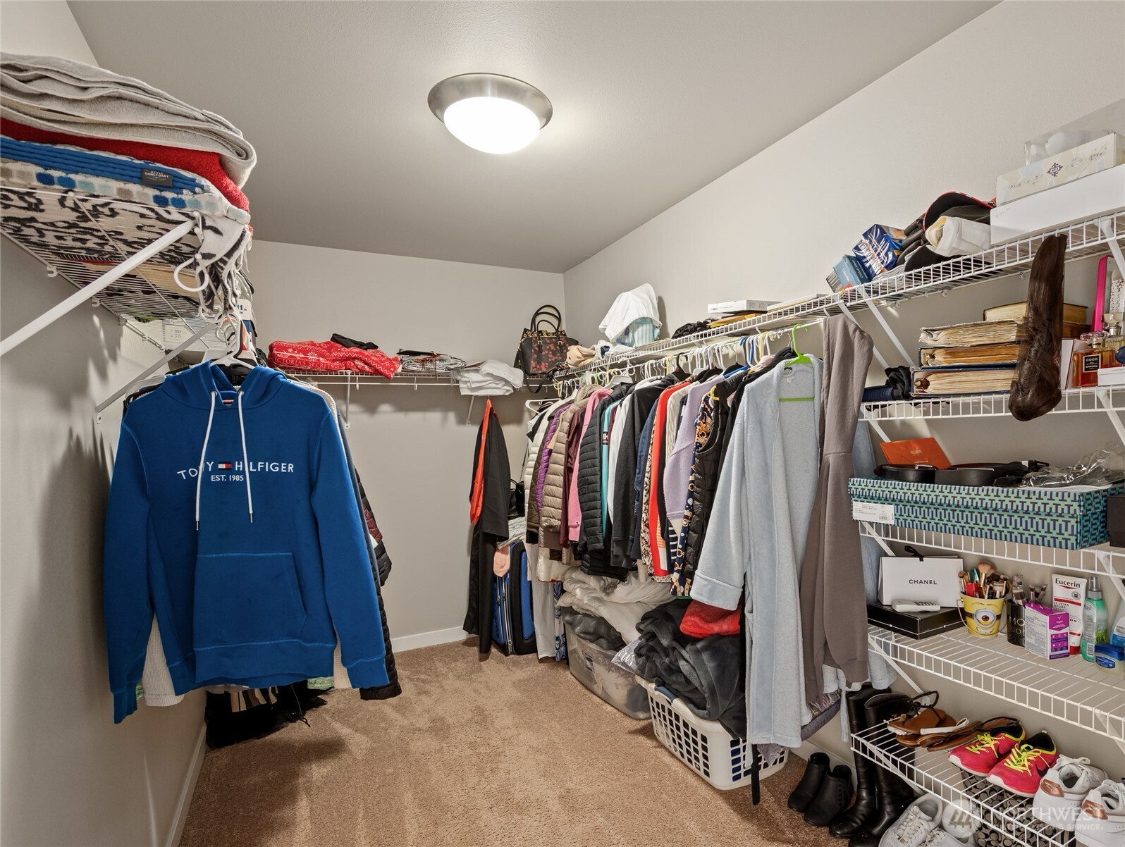 711 10th Street Sultan, WA 98294 - Photo 21 of 30 a view of walk in closet with clothes and shoes