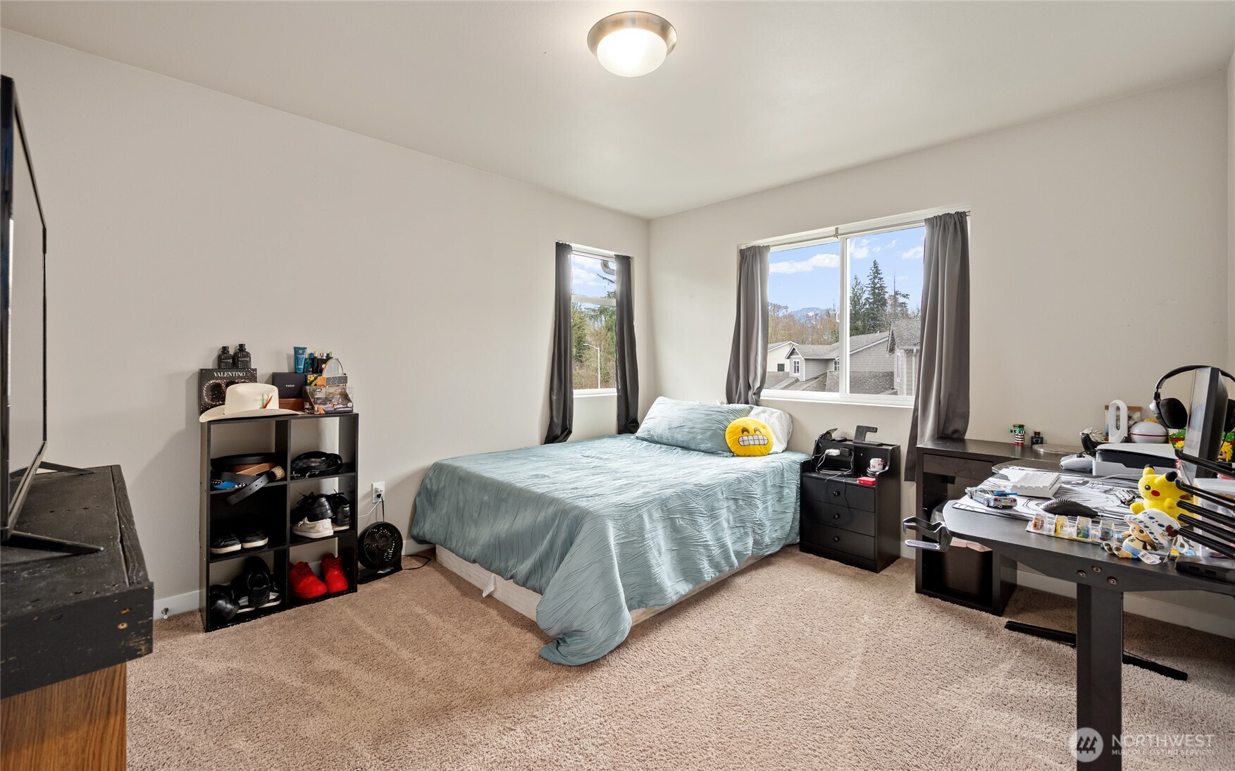 711 10th Street Sultan, WA 98294 - Photo 26 of 30 a bedroom with bed and a window