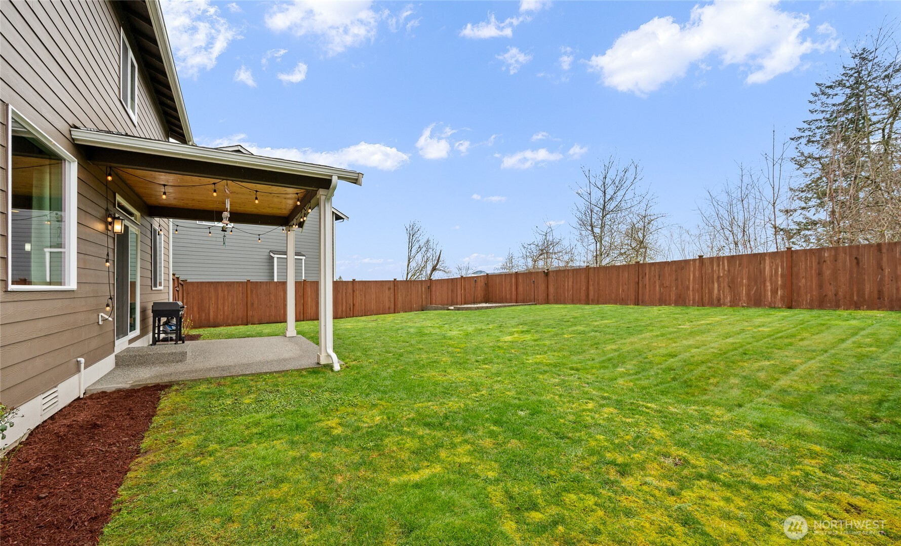 711 10th Street Sultan, WA 98294 - Photo 27 of 30 a view of a backyard