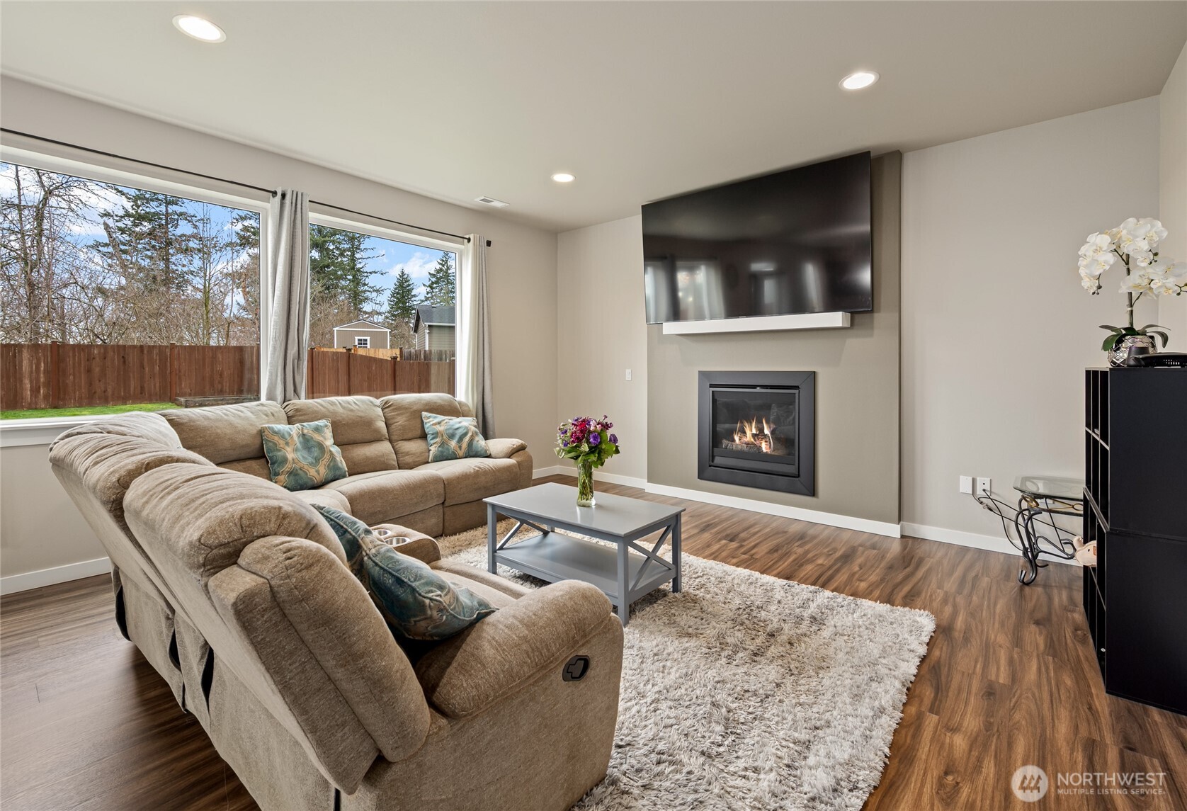 711 10th Street Sultan, WA 98294 - Photo 6 of 30 a living room with furniture fireplace and flat screen tv