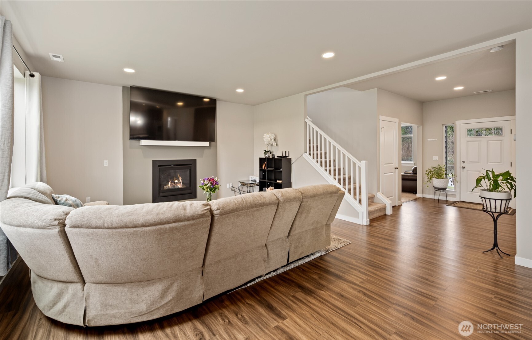 711 10th Street Sultan, WA 98294 - Photo 7 of 30 a living room with furniture and a fireplace