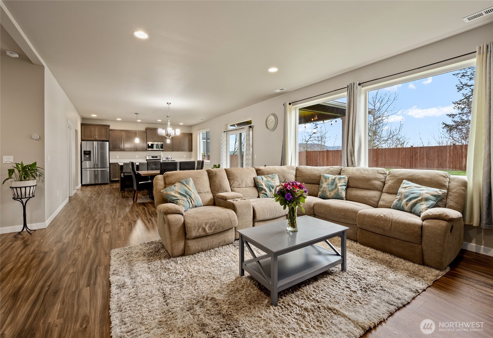 711 10th Street Sultan, WA 98294 - Photo 8 of 30 a living room with furniture and a large window