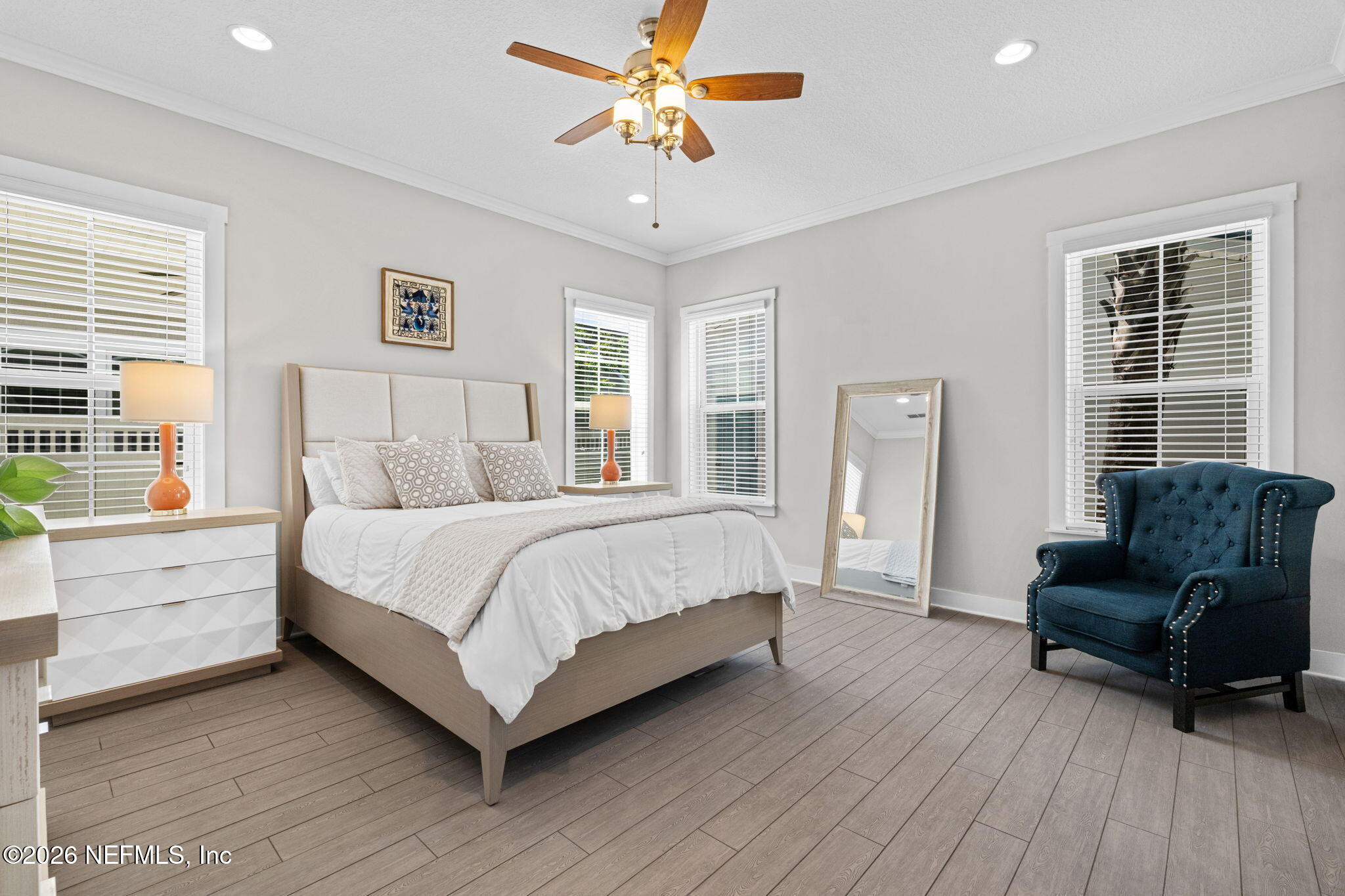 44 Fremont Avenue St. Augustine, FL 32095 - Photo 16 of 72 a spacious bedroom with a bed and a couch