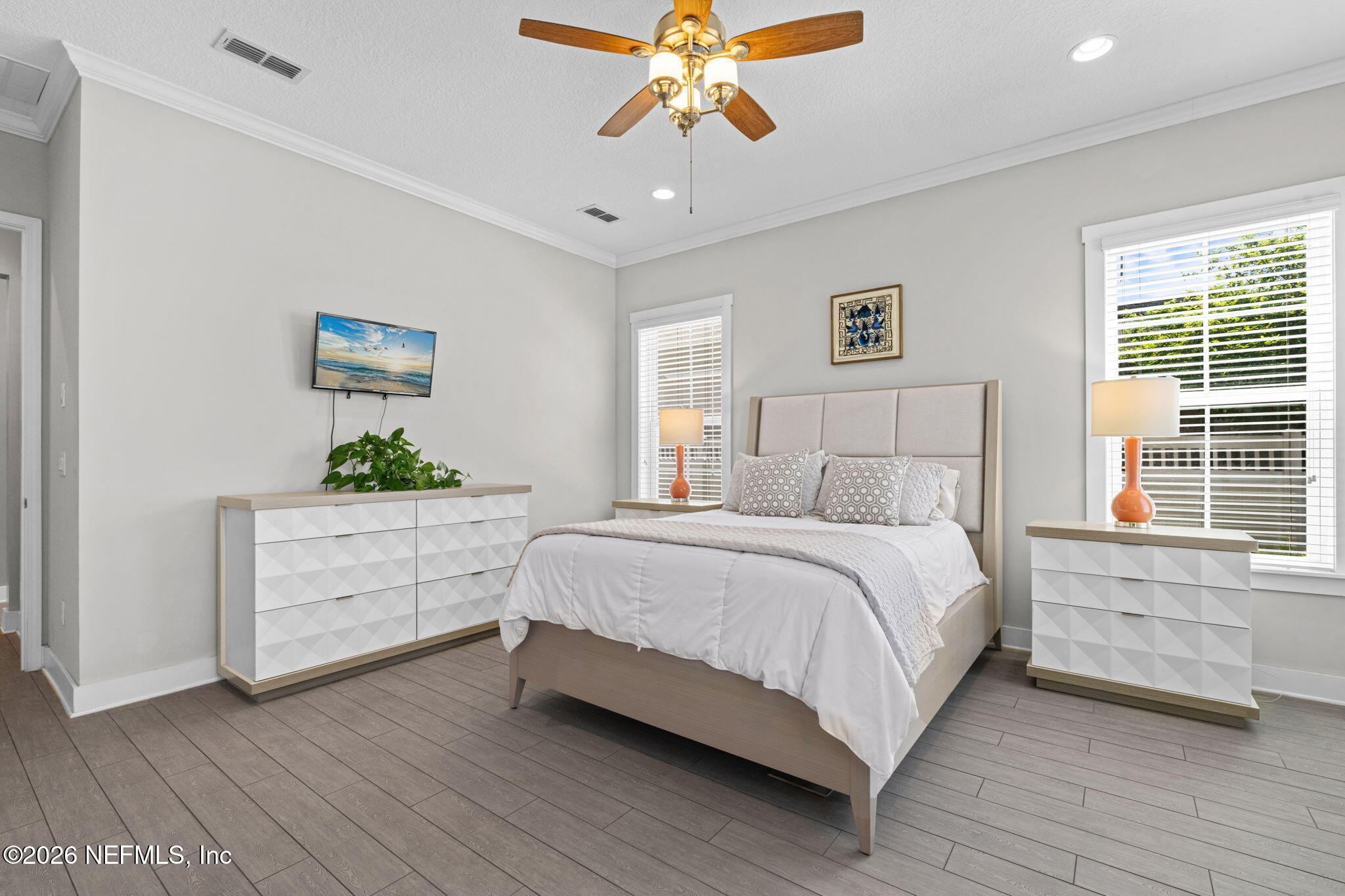 44 Fremont Avenue St. Augustine, FL 32095 - Photo 17 of 72 a spacious bedroom with a bed and a window