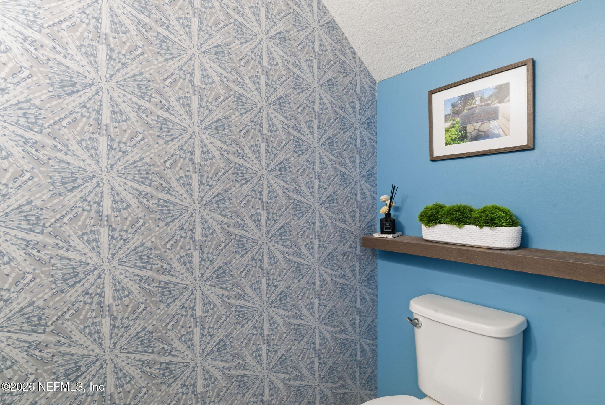 44 Fremont Avenue St. Augustine, FL 32095 - Photo 23 of 72 a bathroom with a toilet and a sink