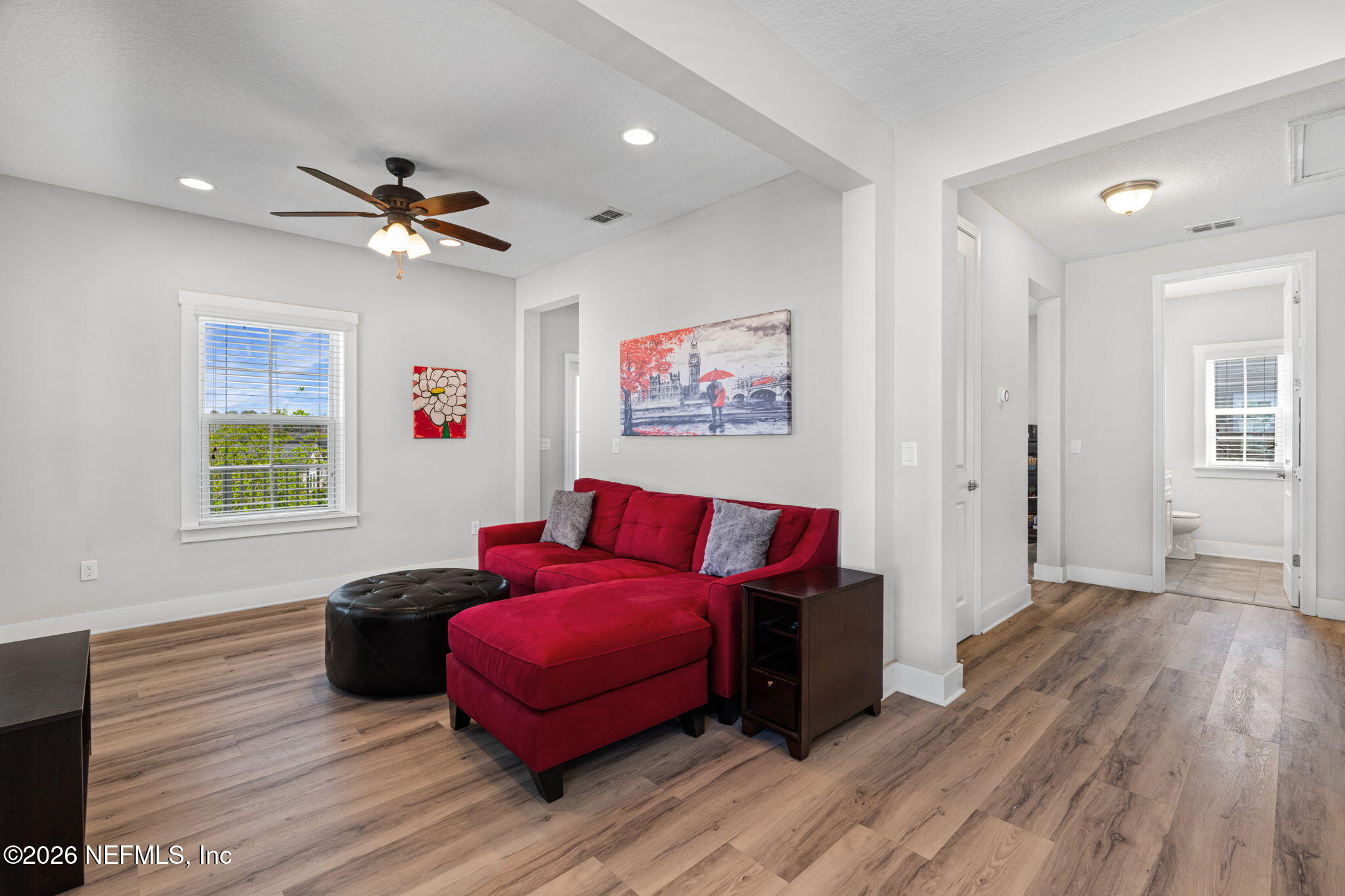 44 Fremont Avenue St. Augustine, FL 32095 - Photo 27 of 72 a living room with furniture and a wooden floor