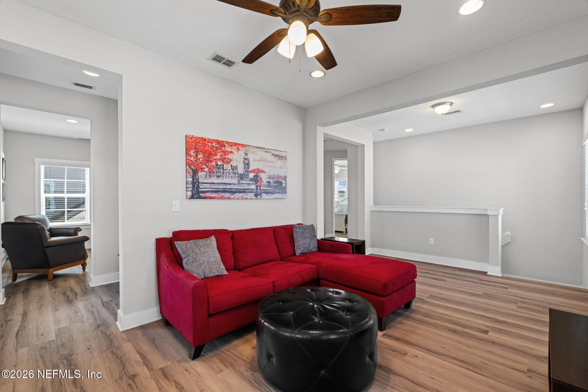 44 Fremont Avenue St. Augustine, FL 32095 - Photo 29 of 72 a living room with furniture and wooden floor