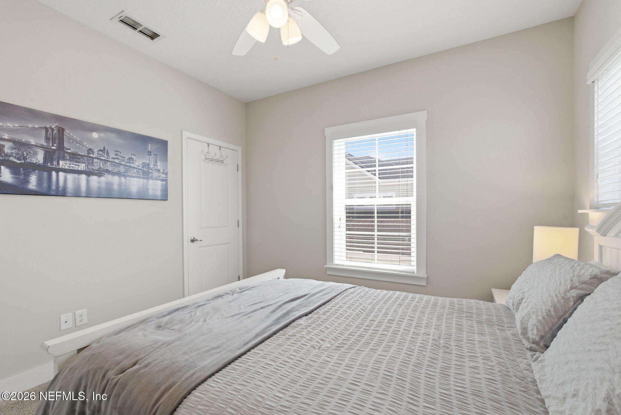 44 Fremont Avenue St. Augustine, FL 32095 - Photo 31 of 72 a bedroom with a bed and a window