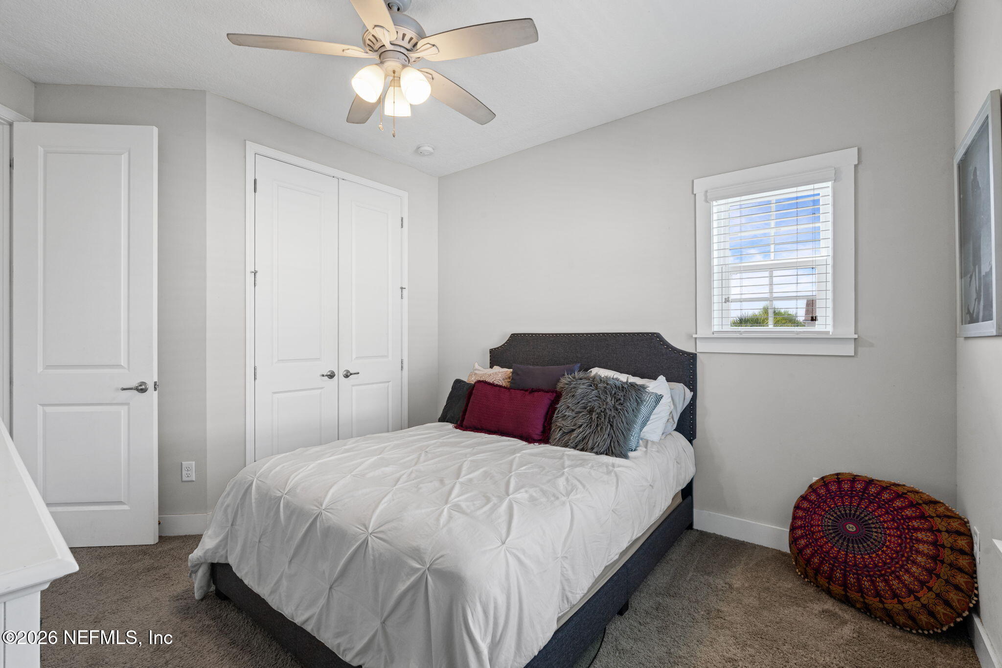 44 Fremont Avenue St. Augustine, FL 32095 - Photo 34 of 72 a bedroom with a bed and a window