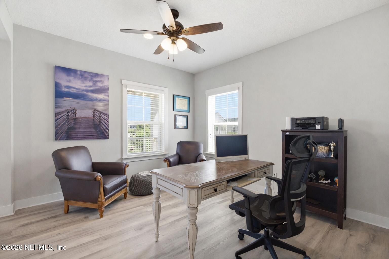 44 Fremont Avenue St. Augustine, FL 32095 - Photo 36 of 72 a workspace with furniture hardwood and a window