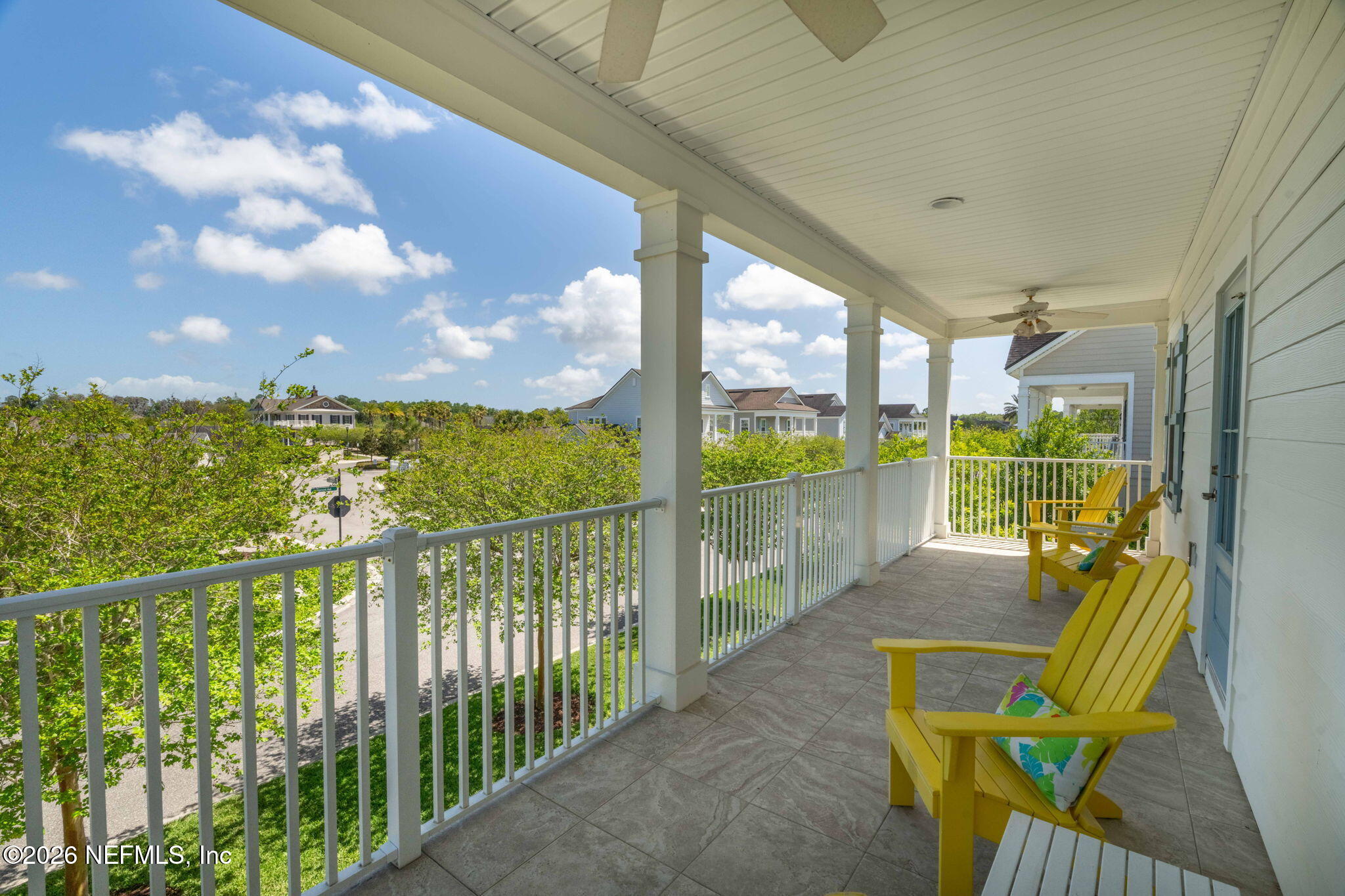 44 Fremont Avenue St. Augustine, FL 32095 - Photo 39 of 72 a view of a balcony with floor to ceiling windows with wooden floor