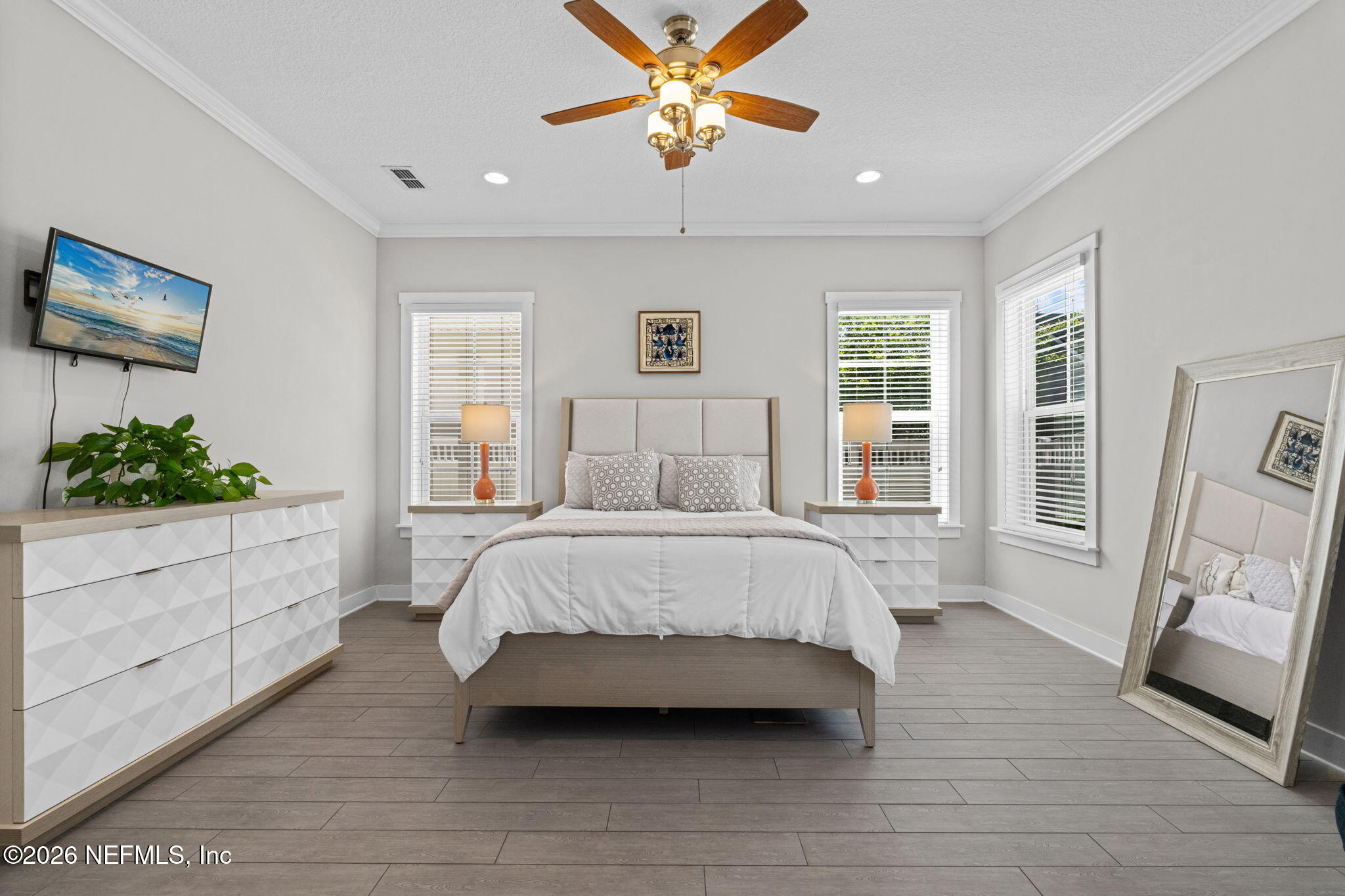44 Fremont Avenue St. Augustine, FL 32095 - Photo 4 of 72 a spacious bedroom with a bed and a window