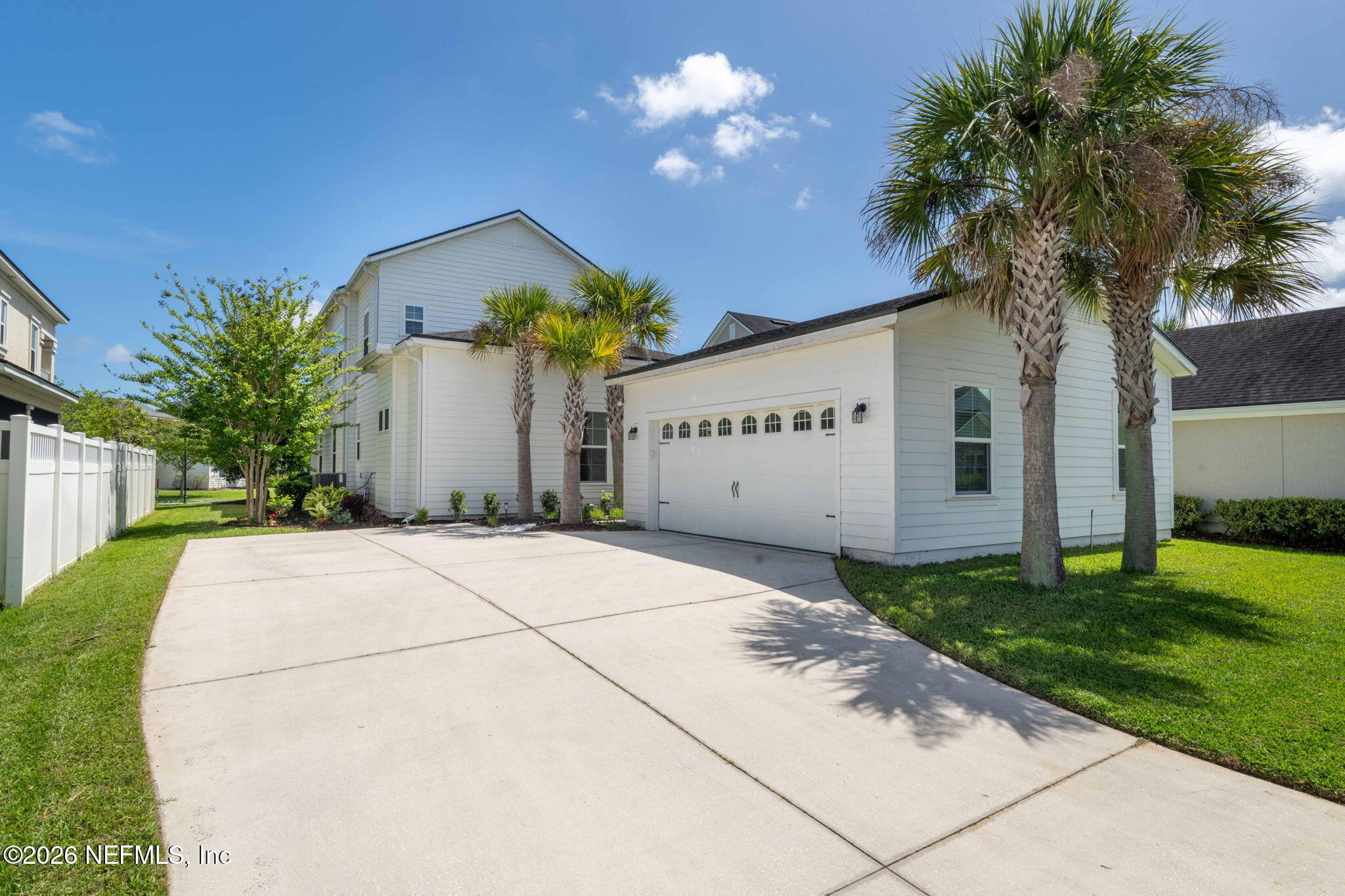44 Fremont Avenue St. Augustine, FL 32095 - Photo 45 of 72 a front view of a house with garden