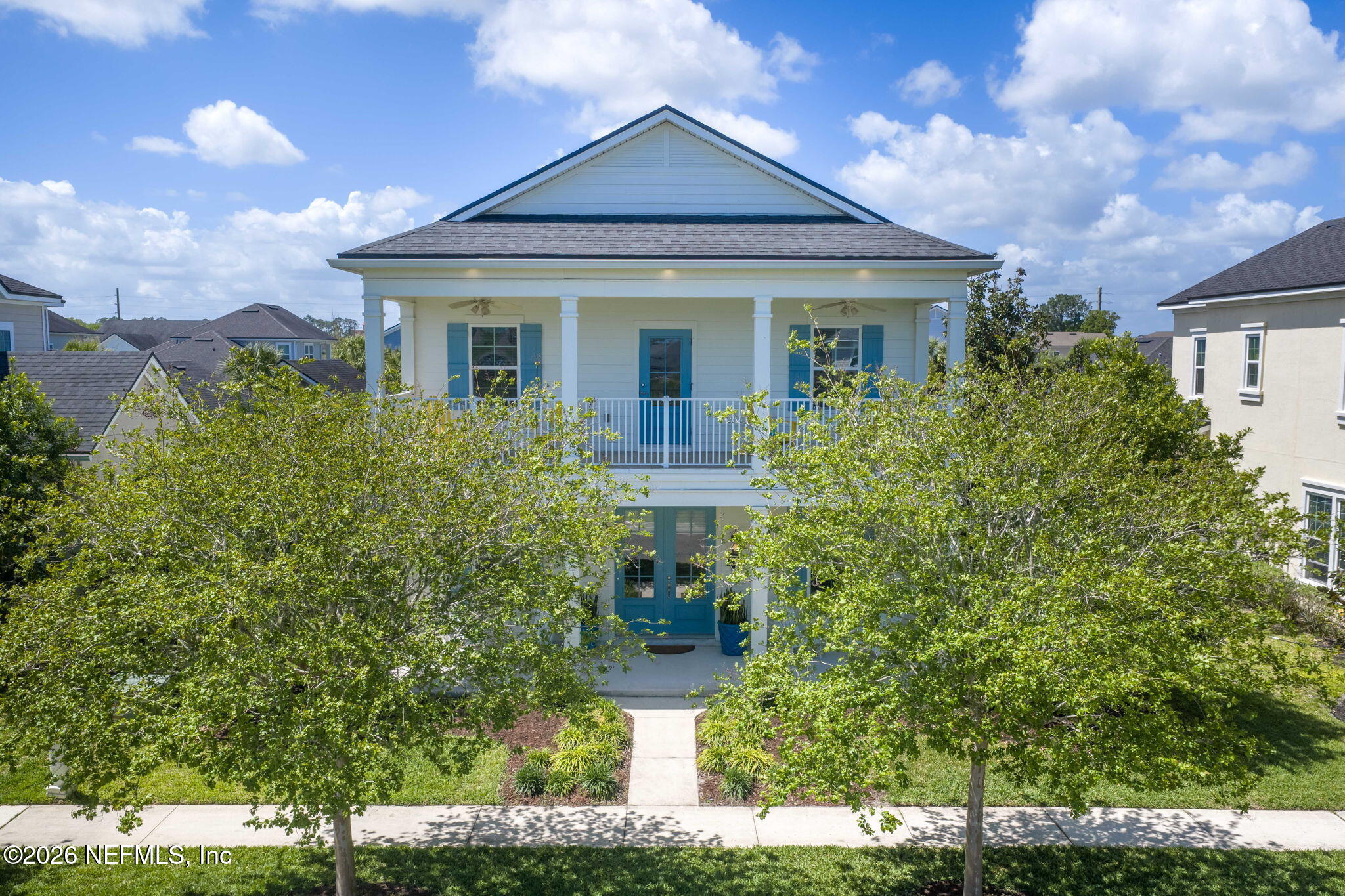 44 Fremont Avenue St. Augustine, FL 32095 - Photo 46 of 72 a front view of a house with garden