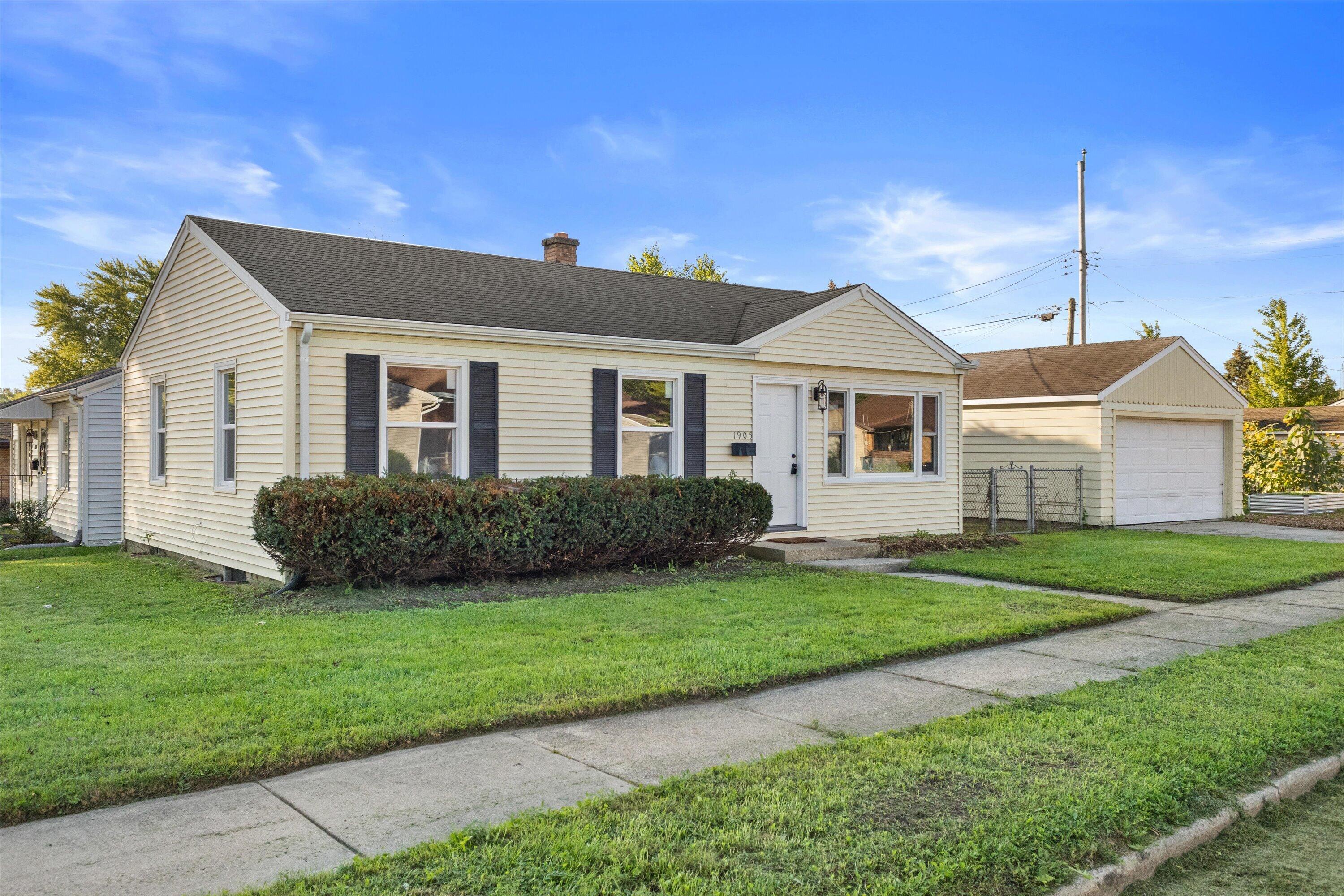 1905 Gilson Street Racine, WI 53403 - Photo 1 of 13 A great view of this charming ranch featuring a simple, easy-care exterior and inviting front entrance.