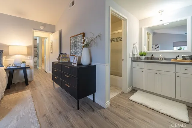 a bed room with a bed and a window