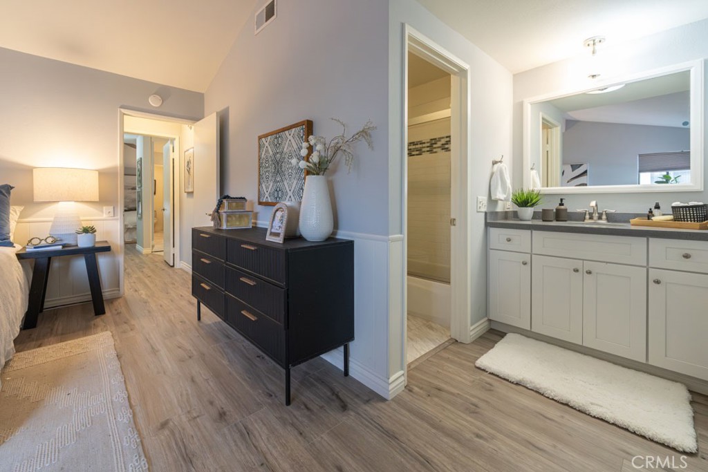 5002 East Atherton Street Long Beach, CA 90815 - Photo 28 of 52 a living room with furniture and a wooden floor