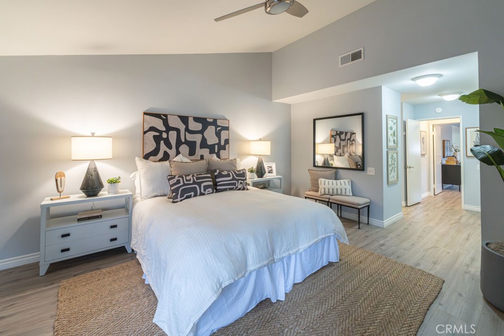 5002 East Atherton Street Long Beach, CA 90815 - Photo 31 of 52 a bedroom with bed and window