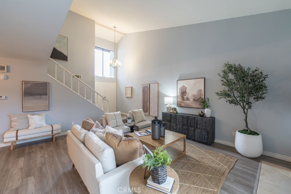5002 East Atherton Street Long Beach, CA 90815 - Photo 4 of 52 a living room with furniture and a potted plant