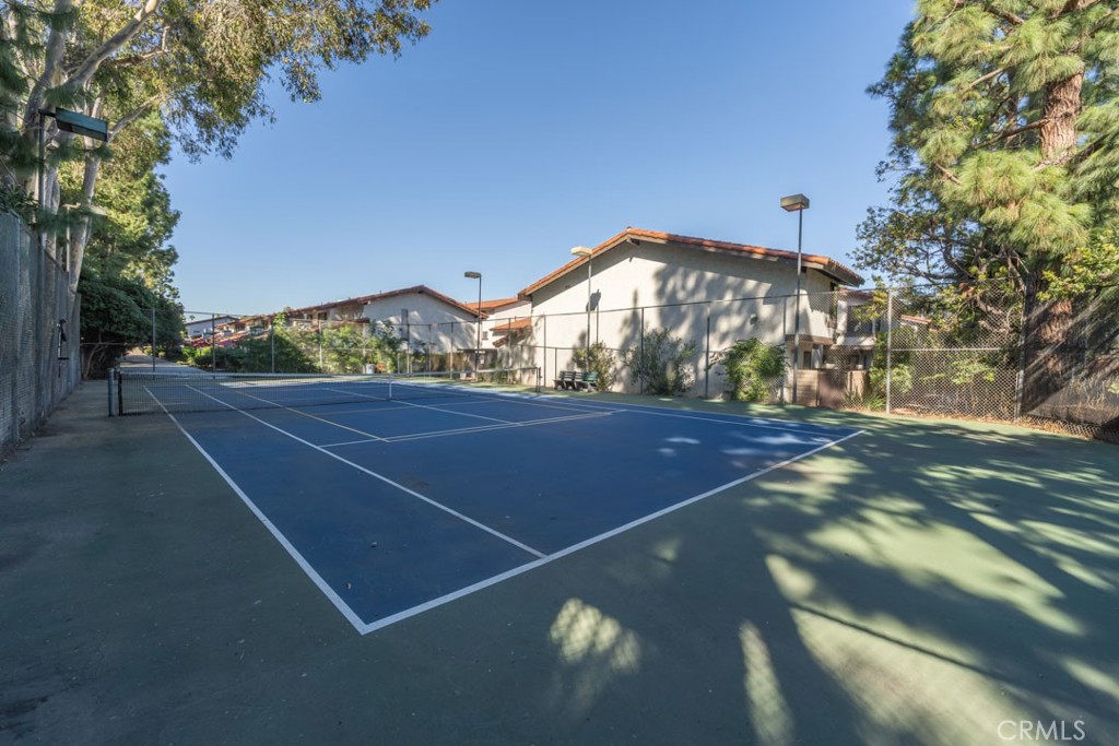 5002 East Atherton Street Long Beach, CA 90815 - Photo 48 of 52 a view of a tennis court