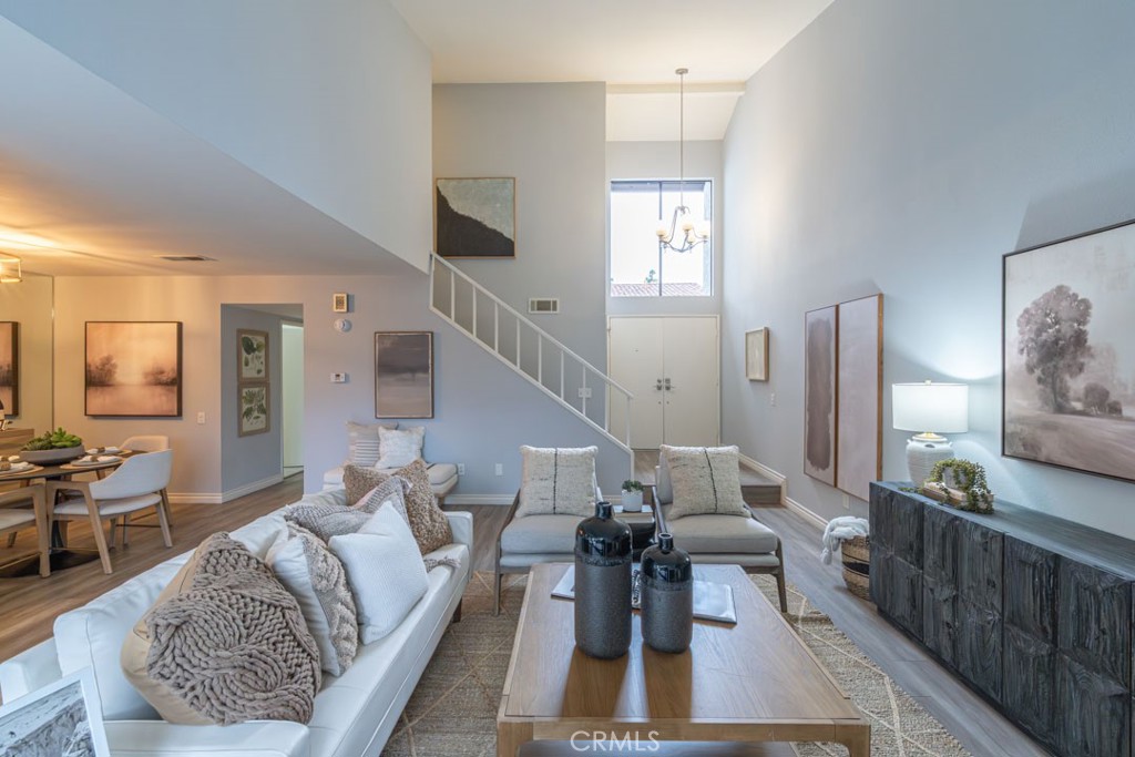 5002 East Atherton Street Long Beach, CA 90815 - Photo 5 of 52 a living room with furniture and wooden floor