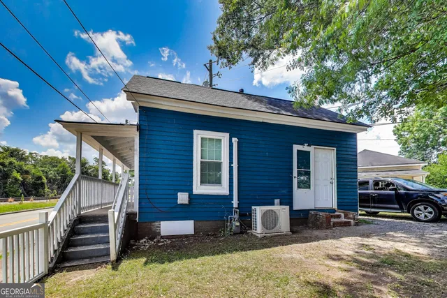 a view of a house with a patio