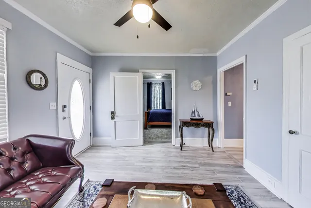 a living room with furniture and a table
