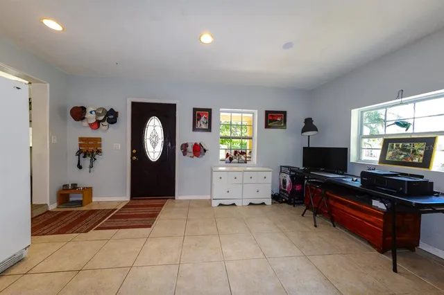 a view of swimming pool with a patio