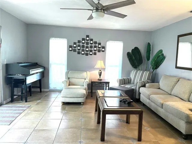 a view of outdoor space with deck and yard