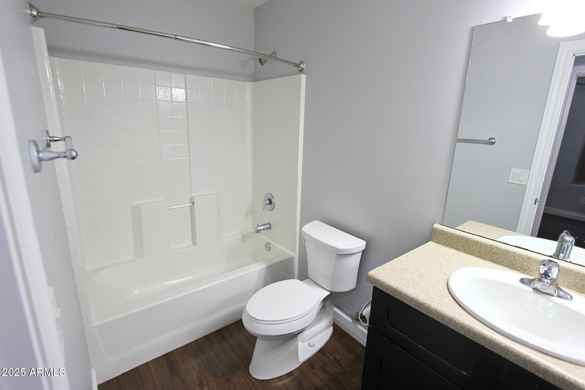 854 South San Marcos Drive, Unit A4 Apache Junction, AZ 85120 - Photo 11 of 22 a bathroom with a sink toilet and shower
