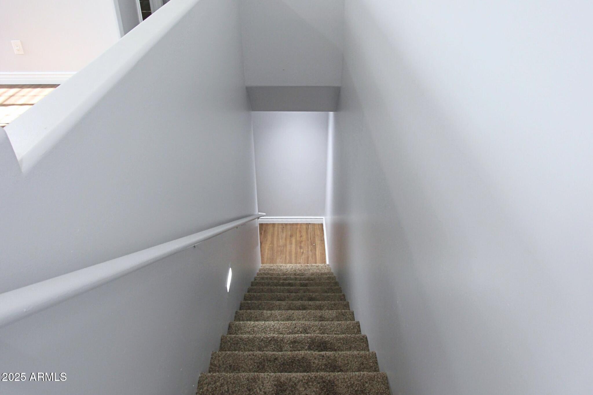 854 South San Marcos Drive, Unit A4 Apache Junction, AZ 85120 - Photo 13 of 22 a view of a hallway with stairs