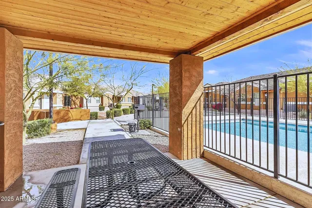 a view of a porch with wooden floor