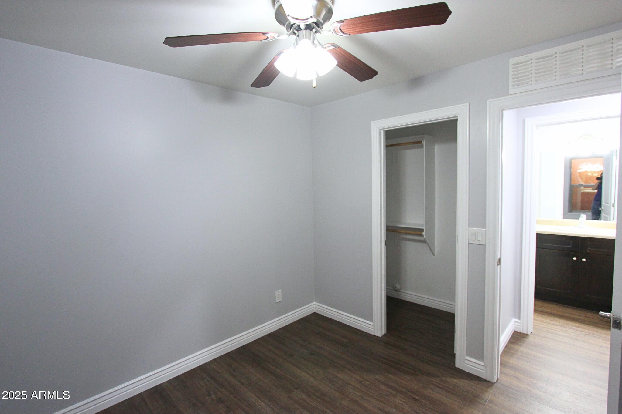 854 South San Marcos Drive, Unit A4 Apache Junction, AZ 85120 - Photo 10 of 22 wooden floor in an empty room