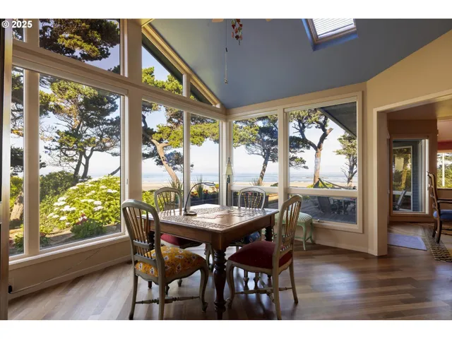 a spacious bedroom with a bed and a large window