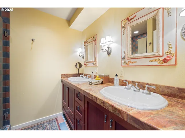 a bed room with a bed and a television