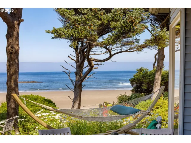 a view of a balcony with an ocean view