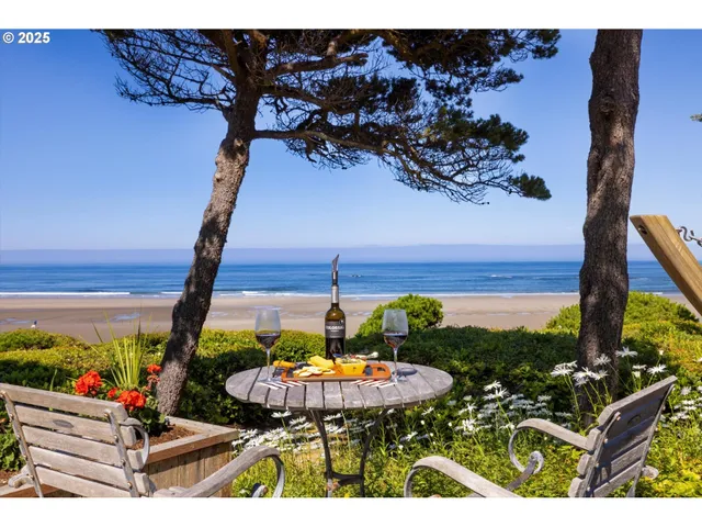 a house with lots of trees in the background