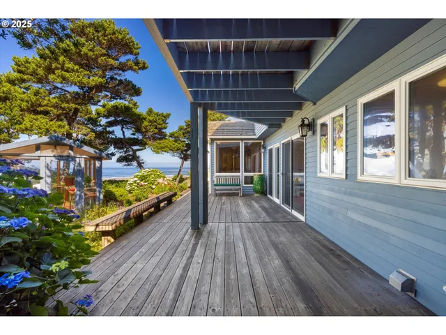 a view of a wooden door and bench