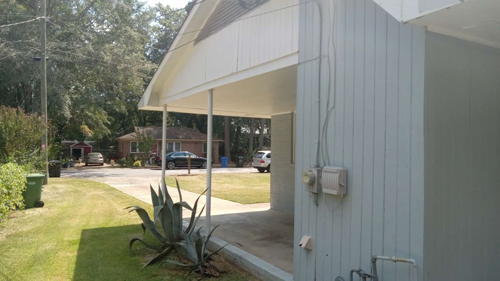 4229 Barr Street Columbus, GA 31907 - Photo 3 of 6 a view of a swimming pool with a porch