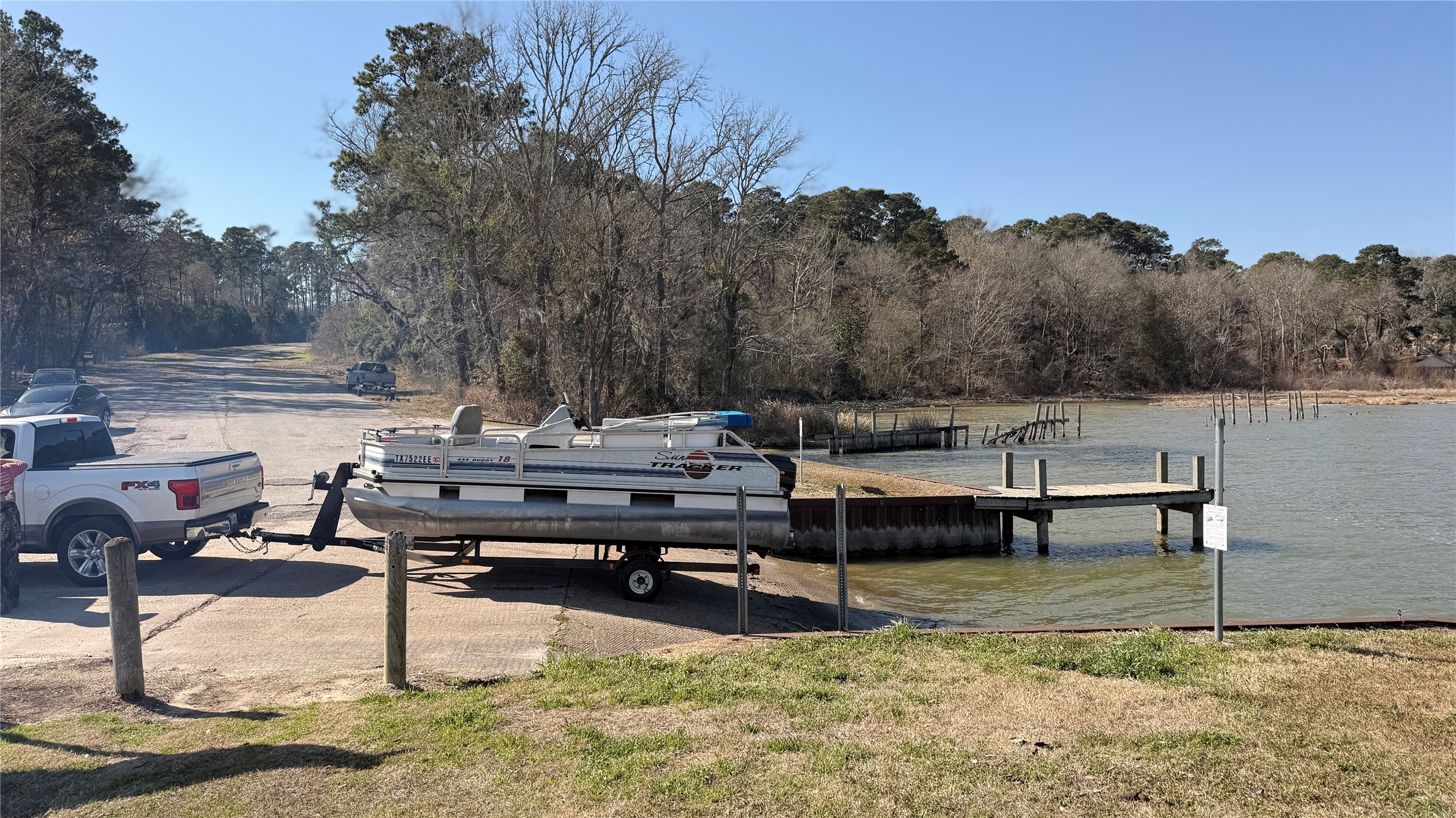 0 State Highway Point Blank, TX 77364 - Photo 6 of 6 a view of a lake with outdoor seating