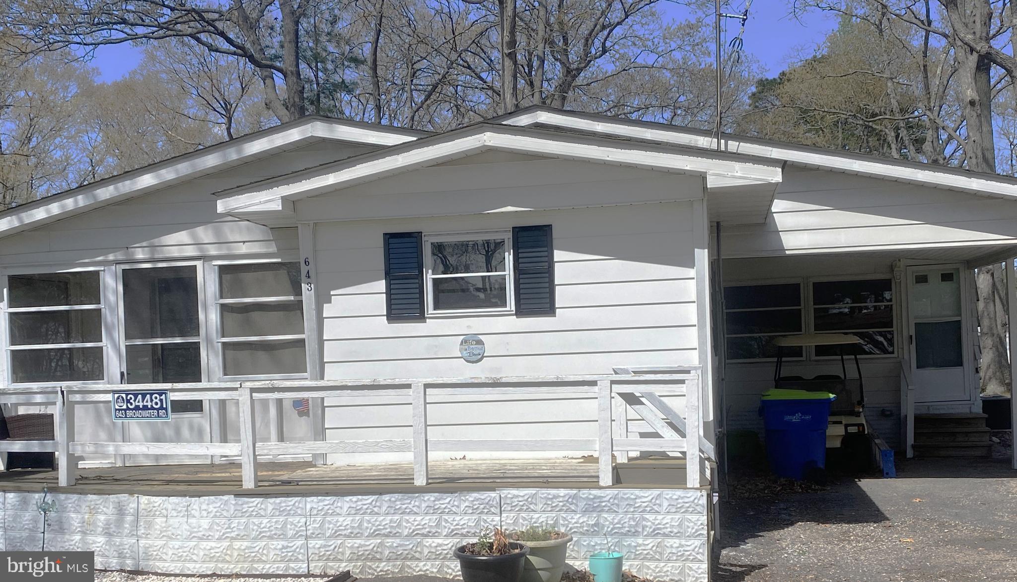 34481 Broad Water Road, Unit 643 Long Neck, DE 19966 - Photo 2 of 32 a side view of a house