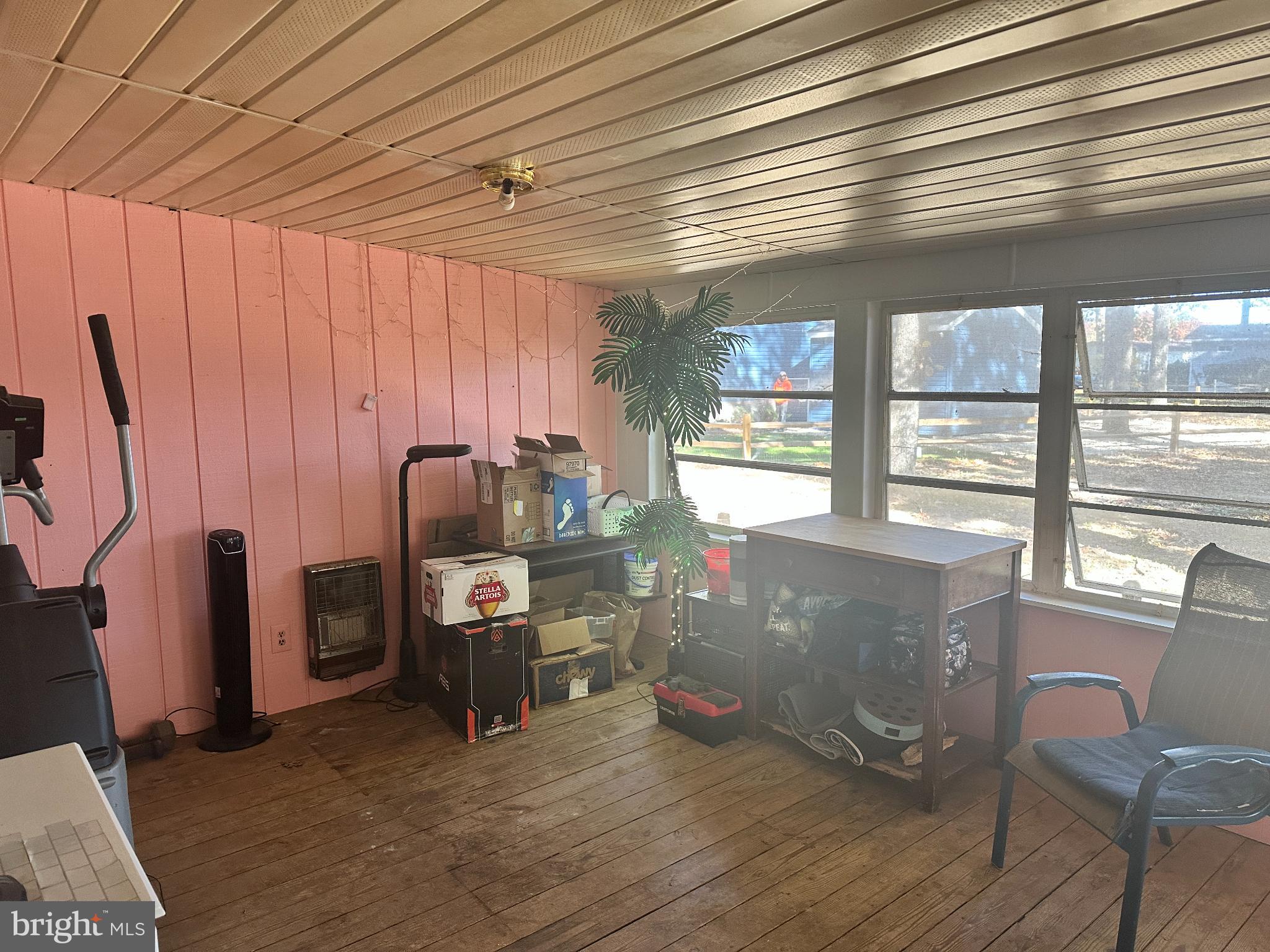 34481 Broad Water Road, Unit 643 Long Neck, DE 19966 - Photo 4 of 21 a view of a livingroom with furniture and a window