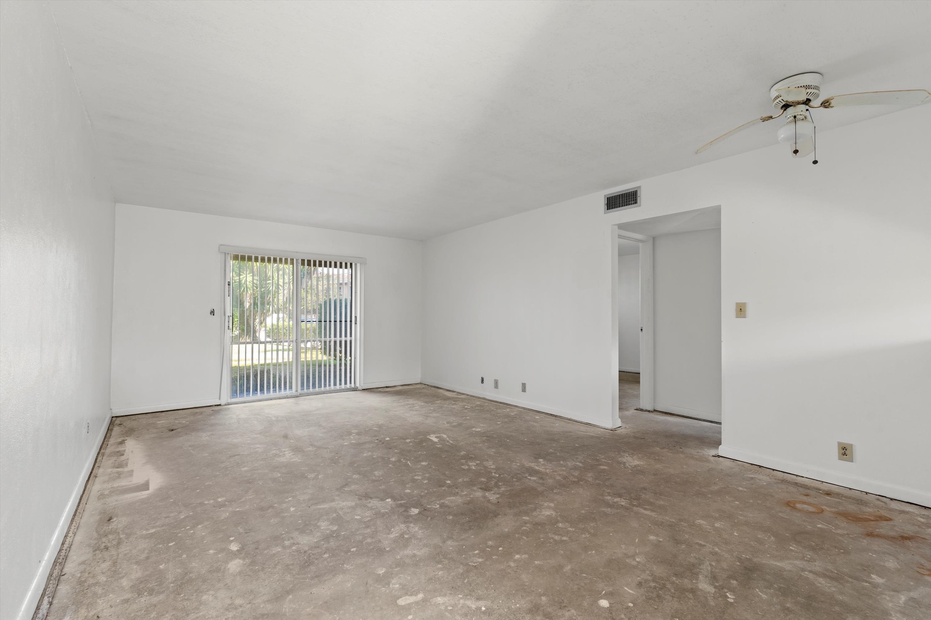 22 Comares Avenue, Unit 5B St. Augustine, FL 32080 - Photo 15 of 23 a view of an empty room with a window