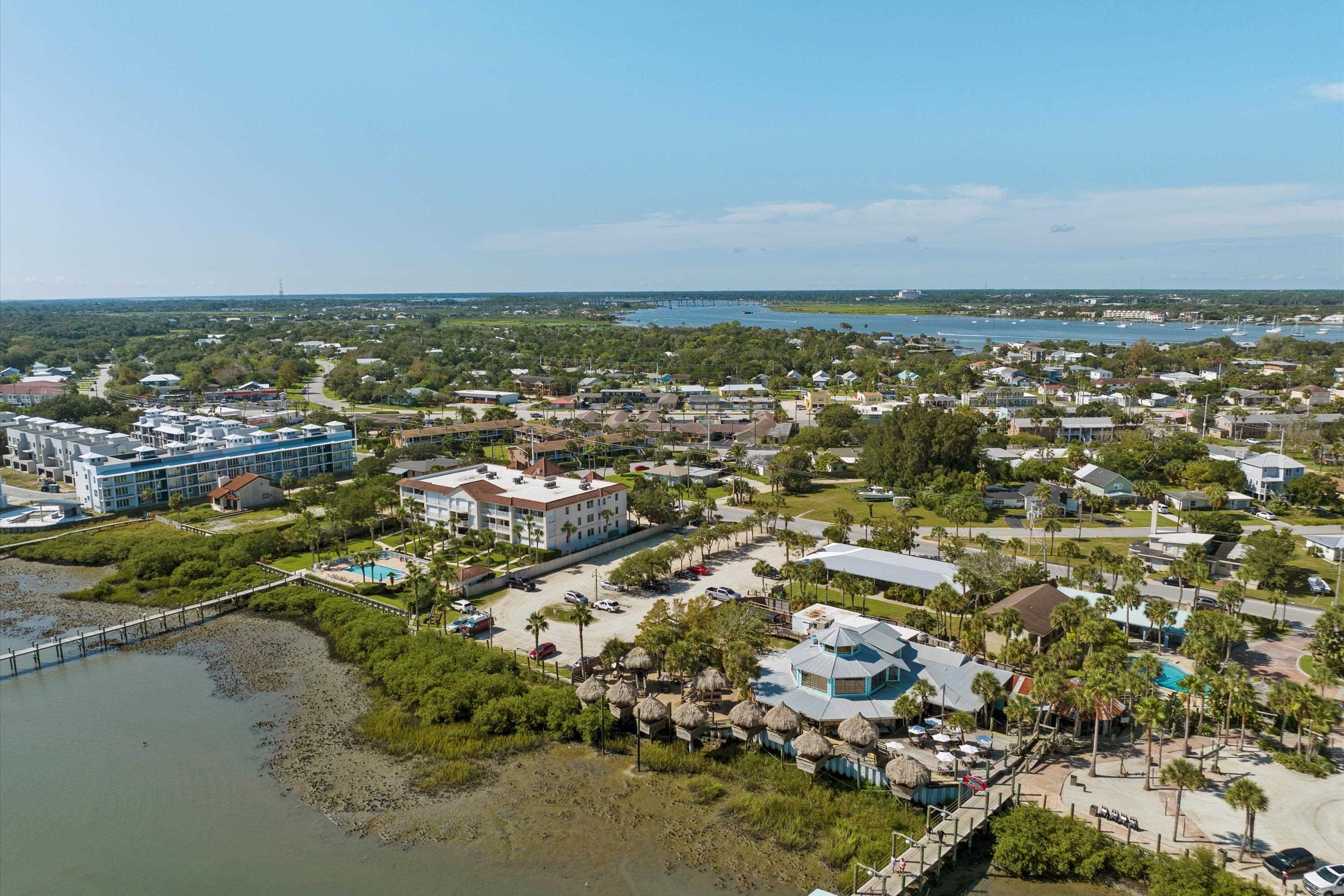 22 Comares Avenue, Unit 5B St. Augustine, FL 32080 - Photo 9 of 23 an aerial view of residential houses with outdoor space and trees