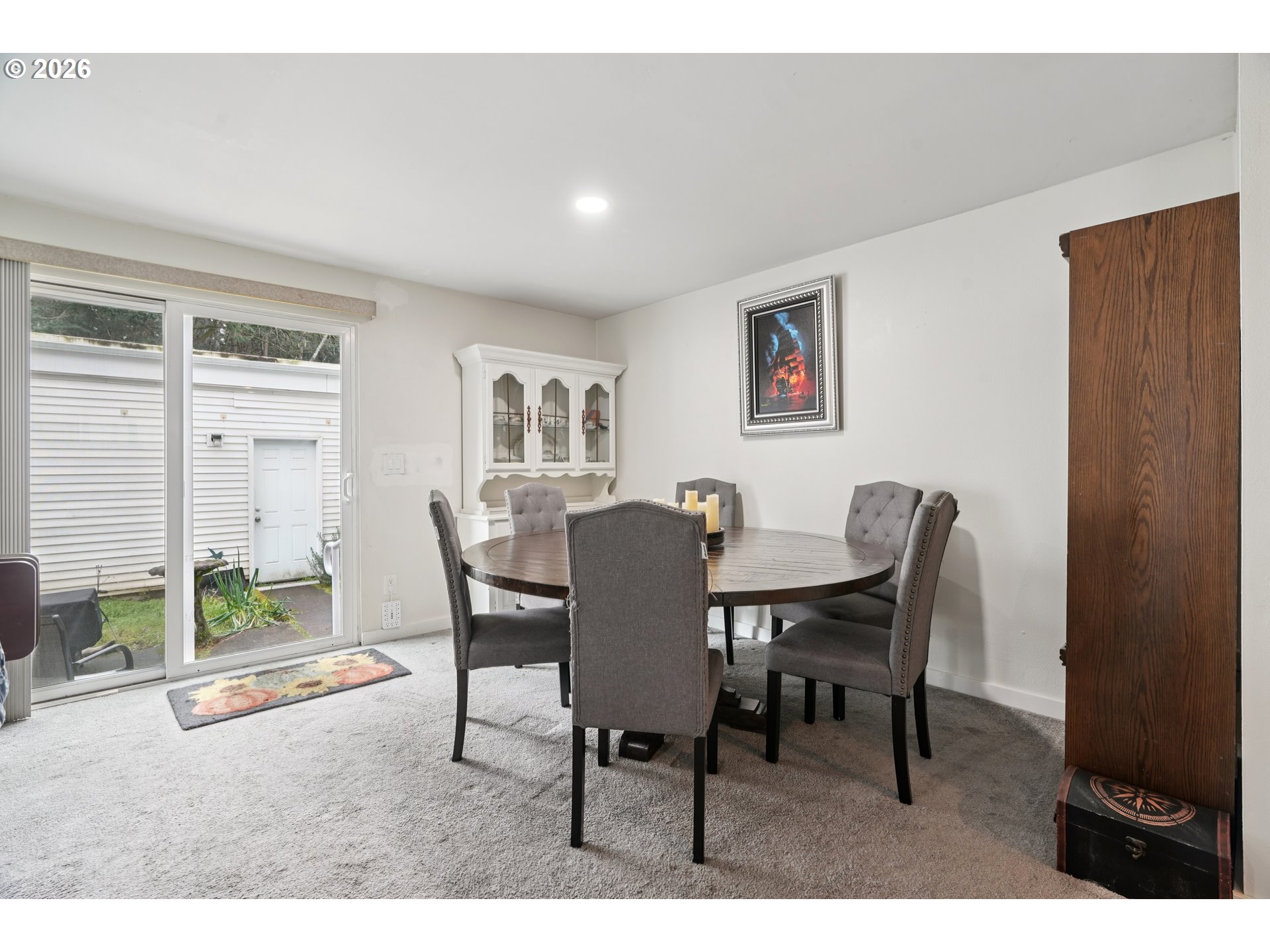 13050 Southwest 17th Street Beaverton, OR 97008 - Photo 11 of 35 a view of a dining room with furniture and a window