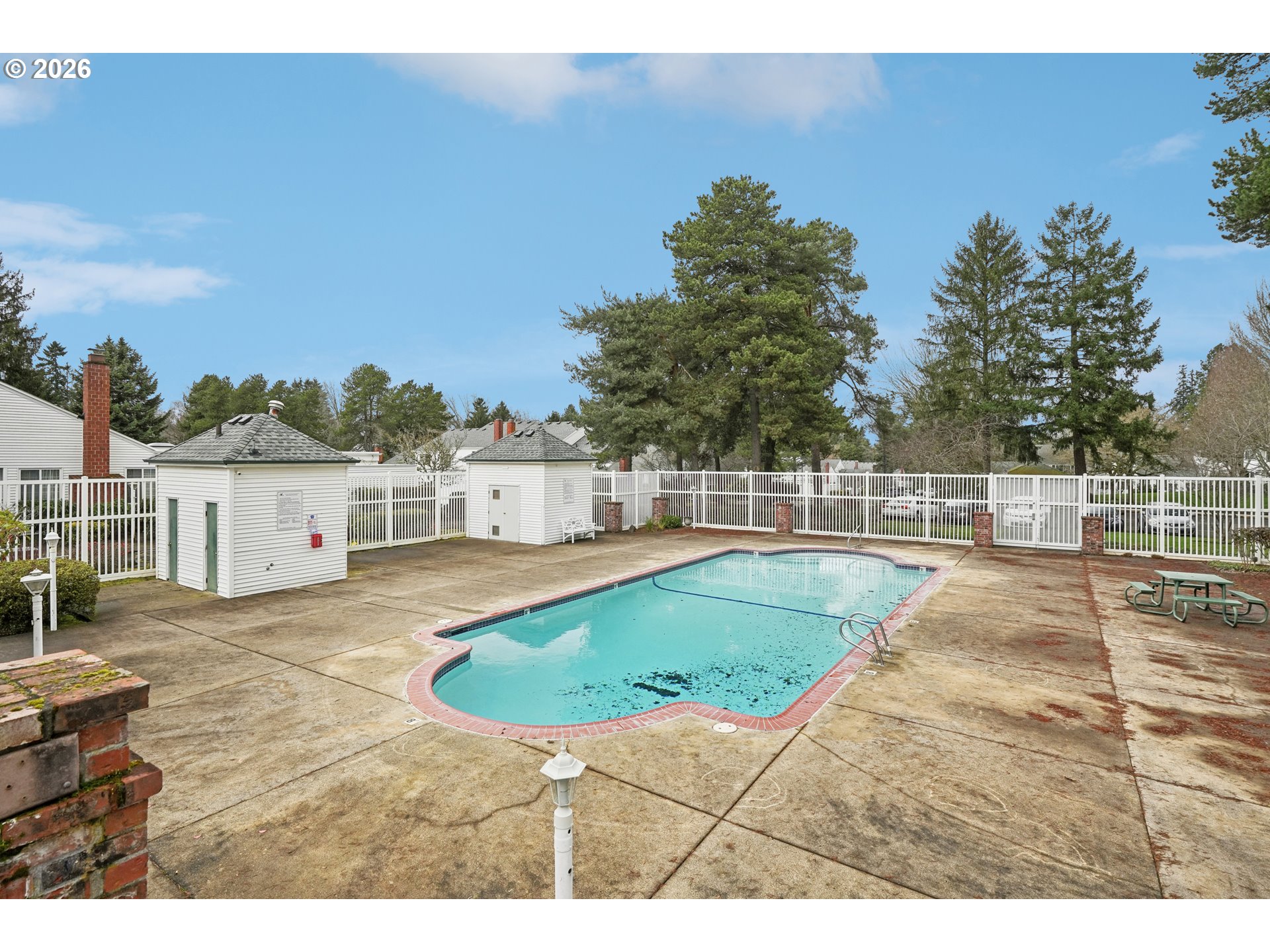 13050 Southwest 17th Street Beaverton, OR 97008 - Photo 33 of 35 a view of a swimming pool with a lounge chair