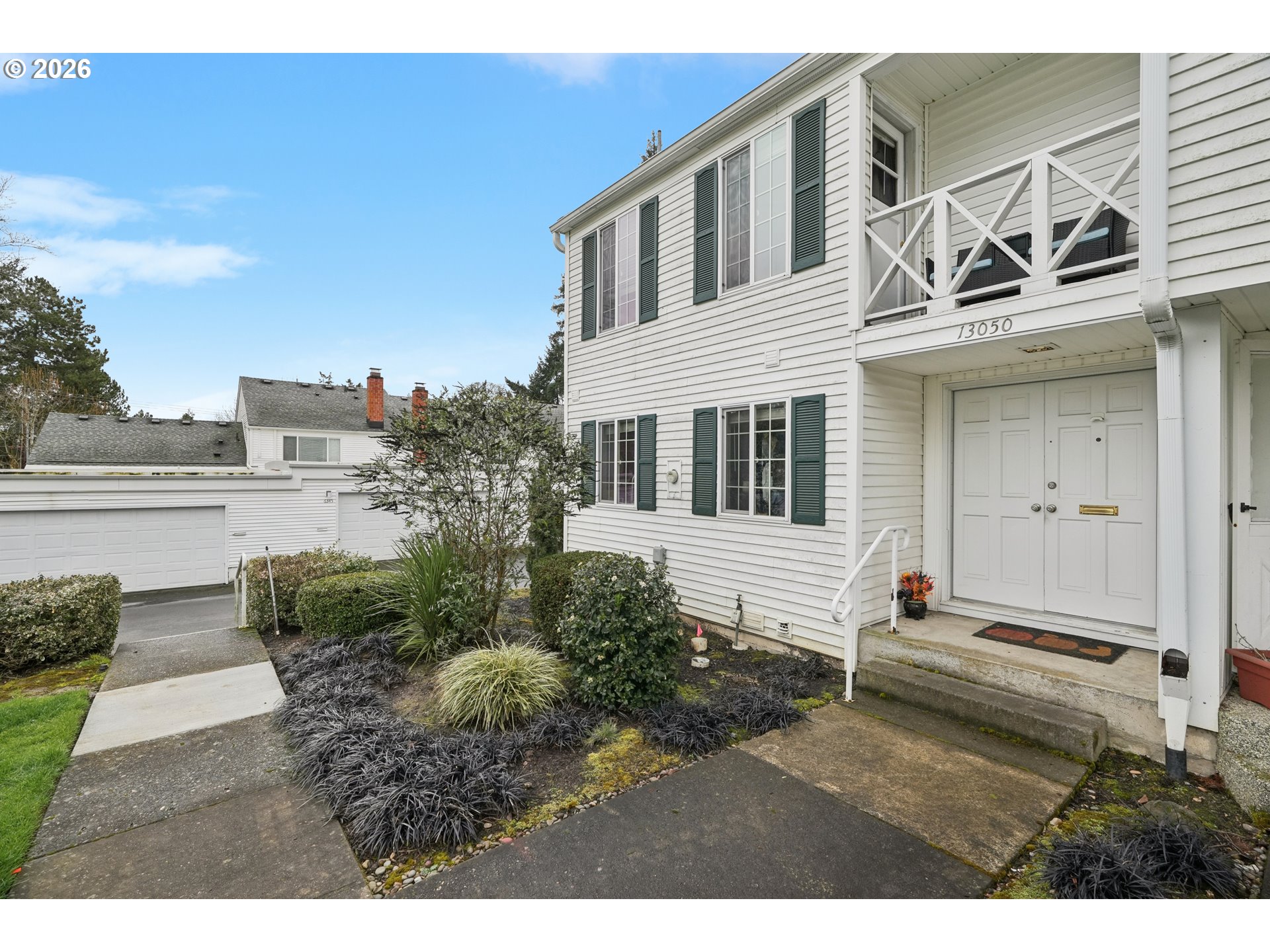 13050 Southwest 17th Street Beaverton, OR 97008 - Photo 4 of 35 a view of a front of house with a yard