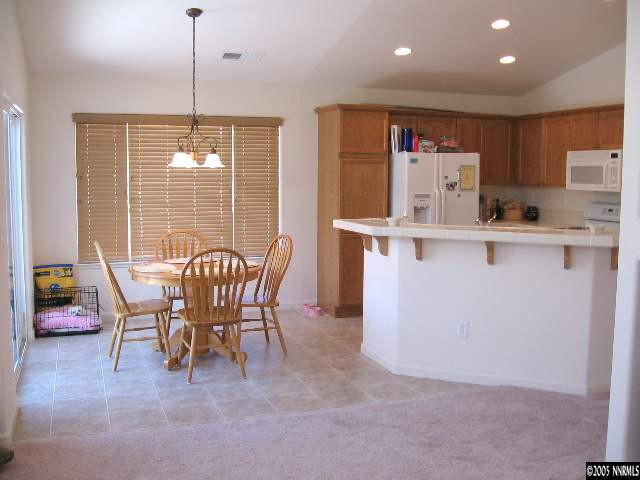 1753 Camaraderie Way Reno, NV 89521 - Photo 2 of 8 a dining room with furniture and window