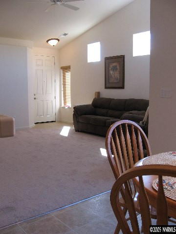 1753 Camaraderie Way Reno, NV 89521 - Photo 7 of 8 a view of staircase with furniture and wooden floor
